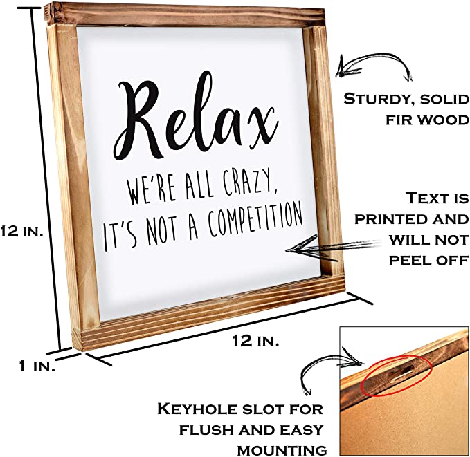 Relax We're all Crazy its not a Competition sign